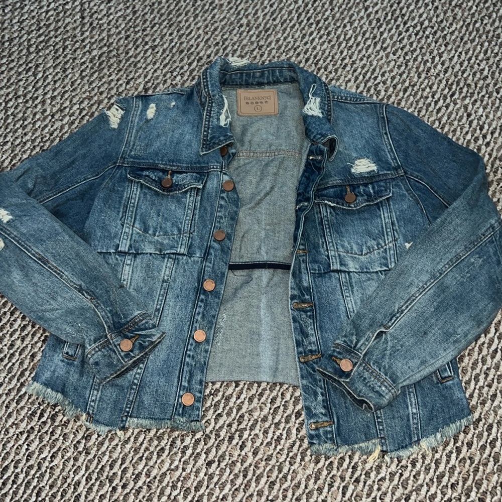 Distressed denim jacket. Never worn.